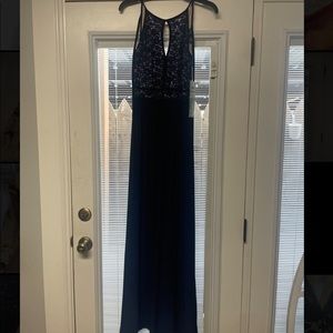 Navy blue dress with a lace top and nude color under. Never worn